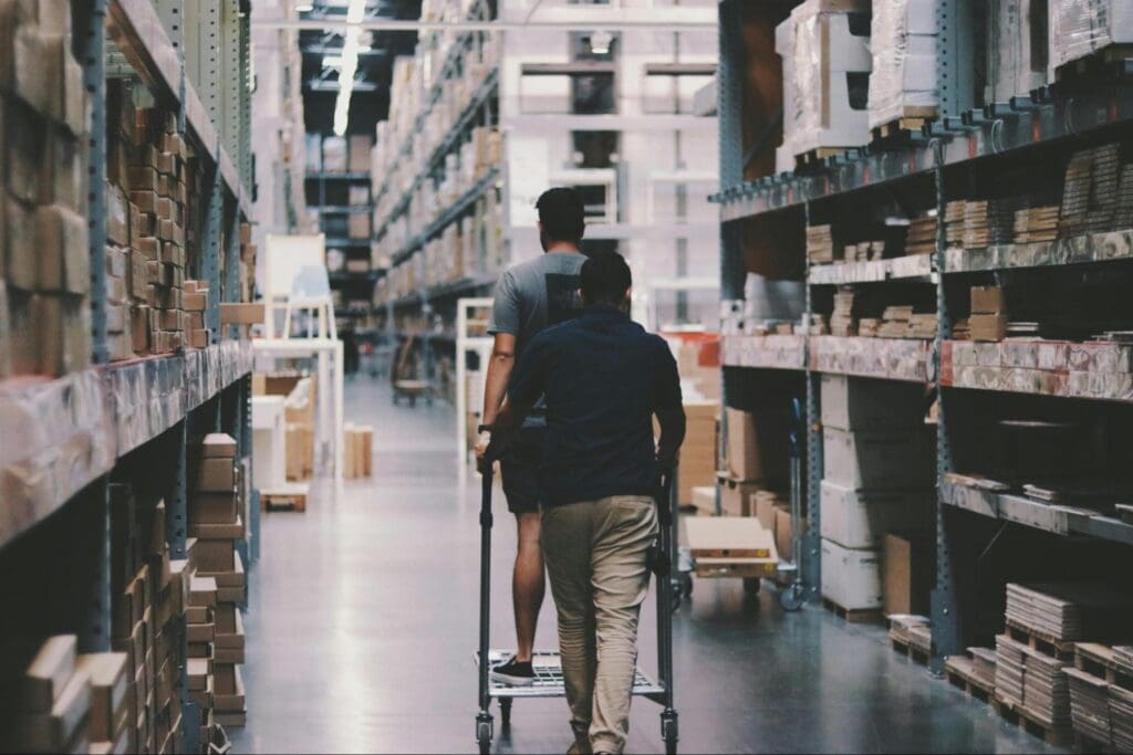 Workers walking in a warehouse